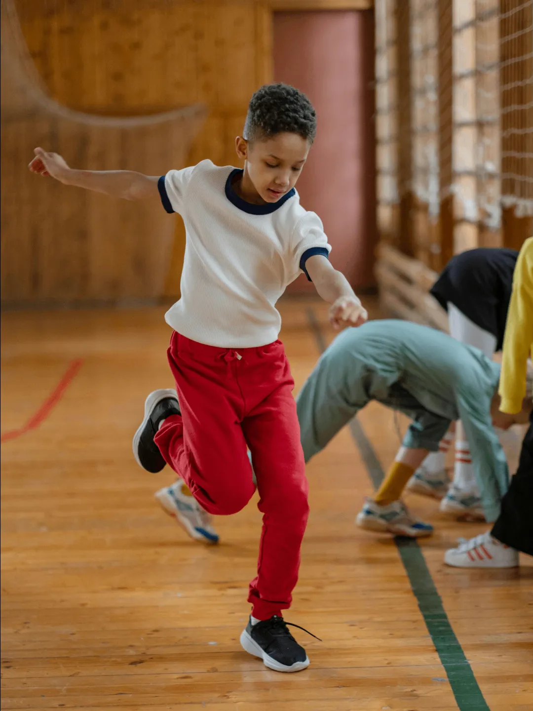 Enfant pratiquant une activité sportive dans le cadre de la SOP 2025